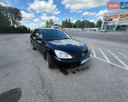 Чорний Міцубісі Lancer, об'ємом двигуна 1.6 л та пробігом 292 тис. км за 3600 $, фото 9 на Automoto.ua