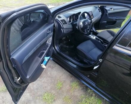 Міцубісі Lancer 2008 у Києві на Automoto.ua Чорний Міцубісі Lancer, об'ємом двигуна 2 л та пробігом 196 тис. км за 5500 $, фото 12 на Automoto.ua