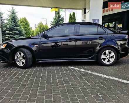 Чорний Міцубісі Lancer, об'ємом двигуна 2 л та пробігом 240 тис. км за 7850 $, фото 11 на Automoto.ua