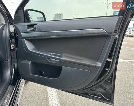 Чорний Міцубісі Lancer, об'ємом двигуна 2 л та пробігом 199 тис. км за 7900 $, фото 22 на Automoto.ua