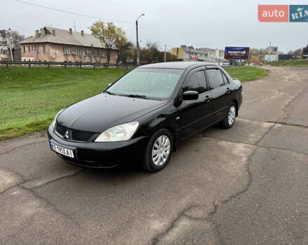 Чорний Міцубісі Lancer, об'ємом двигуна 1.6 л та пробігом 200 тис. км за 4500 $, фото 2 на Automoto.ua