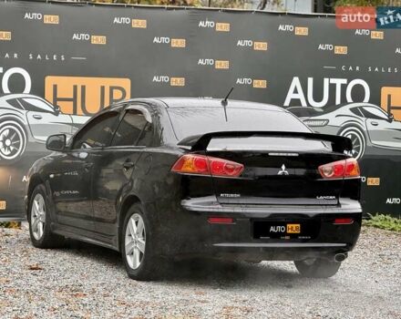 Чорний Міцубісі Lancer, об'ємом двигуна 2 л та пробігом 118 тис. км за 6200 $, фото 4 на Automoto.ua