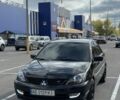 Чорний Міцубісі Lancer, об'ємом двигуна 1.6 л та пробігом 188 тис. км за 2200 $, фото 1 на Automoto.ua
