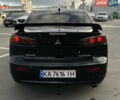 Чорний Міцубісі Lancer, об'ємом двигуна 2 л та пробігом 290 тис. км за 5900 $, фото 12 на Automoto.ua