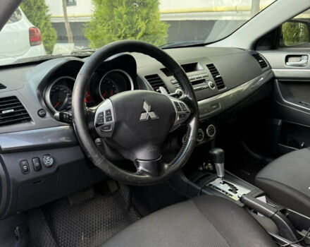 Чорний Міцубісі Lancer, об'ємом двигуна 2 л та пробігом 215 тис. км за 6700 $, фото 8 на Automoto.ua