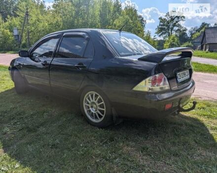 Чорний Міцубісі Lancer, об'ємом двигуна 1.6 л та пробігом 192 тис. км за 3850 $, фото 4 на Automoto.ua