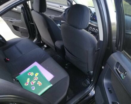 Міцубісі Lancer 2008 у Києві на Automoto.ua Чорний Міцубісі Lancer, об'ємом двигуна 2 л та пробігом 196 тис. км за 5500 $, фото 18 на Automoto.ua