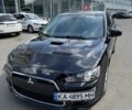 Черный Мицубиси Лансер, объемом двигателя 2 л и пробегом 145 тыс. км за 12000 $, фото 1 на Automoto.ua