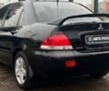 Чорний Міцубісі Lancer, об'ємом двигуна 1.6 л та пробігом 340 тис. км за 6190 $, фото 5 на Automoto.ua