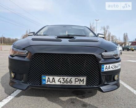 Чорний Міцубісі Lancer, об'ємом двигуна 2 л та пробігом 240 тис. км за 10500 $, фото 1 на Automoto.ua