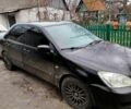 Черный Мицубиси Лансер, объемом двигателя 1.6 л и пробегом 26 тыс. км за 4500 $, фото 1 на Automoto.ua