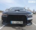 Чорний Міцубісі Lancer, об'ємом двигуна 2 л та пробігом 240 тис. км за 10500 $, фото 1 на Automoto.ua