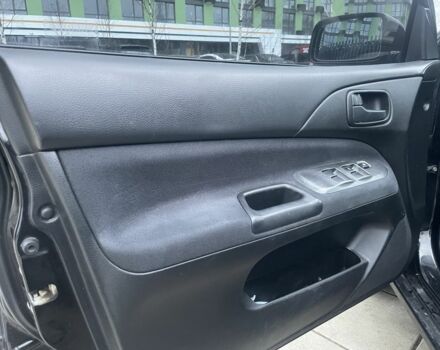 Черный Мицубиси Лансер, объемом двигателя 1.6 л и пробегом 226 тыс. км за 3750 $, фото 11 на Automoto.ua