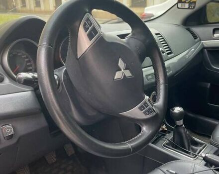 Чорний Міцубісі Lancer, об'ємом двигуна 2 л та пробігом 255 тис. км за 6999 $, фото 9 на Automoto.ua