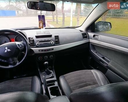 Черный Мицубиси Лансер, объемом двигателя 2 л и пробегом 200 тыс. км за 5100 $, фото 6 на Automoto.ua