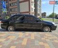 Черный Мицубиси Лансер, объемом двигателя 1.6 л и пробегом 248 тыс. км за 4200 $, фото 5 на Automoto.ua