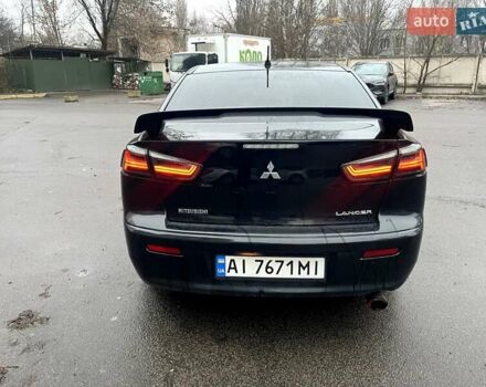 Черный Мицубиси Лансер, объемом двигателя 2 л и пробегом 217 тыс. км за 7000 $, фото 29 на Automoto.ua