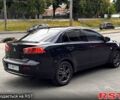 Черный Мицубиси Лансер, объемом двигателя 1.5 л и пробегом 250 тыс. км за 6700 $, фото 2 на Automoto.ua