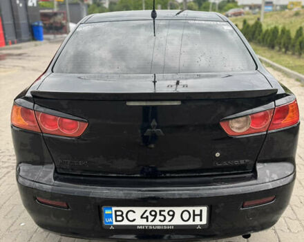 Черный Мицубиси Лансер, объемом двигателя 1.5 л и пробегом 230 тыс. км за 6000 $, фото 2 на Automoto.ua