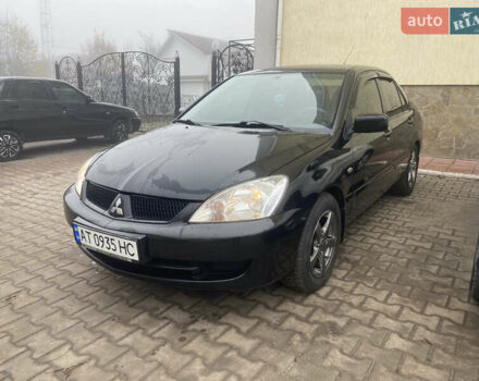 Черный Мицубиси Лансер, объемом двигателя 1.58 л и пробегом 211 тыс. км за 6333 $, фото 17 на Automoto.ua