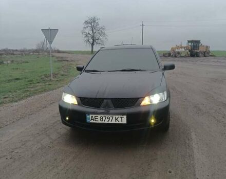 Чорний Міцубісі Lancer, об'ємом двигуна 1.58 л та пробігом 233 тис. км за 4800 $, фото 15 на Automoto.ua