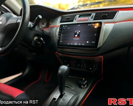 Чорний Міцубісі Lancer, об'ємом двигуна 1.6 л та пробігом 202 тис. км за 5700 $, фото 10 на Automoto.ua