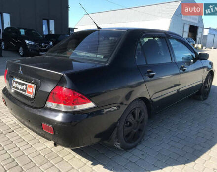 Мицубиси Лансер 2008 в Львове на Automoto.ua Черный Мицубиси Лансер, объемом двигателя 1.6 л и пробегом 356 тыс. км за 4590 $, фото 10 на Automoto.ua