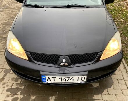 Черный Мицубиси Лансер, объемом двигателя 1.6 л и пробегом 240 тыс. км за 4200 $, фото 6 на Automoto.ua