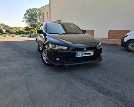Чорний Міцубісі Lancer, об'ємом двигуна 2 л та пробігом 230 тис. км за 6650 $, фото 1 на Automoto.ua