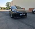 Чорний Міцубісі Lancer, об'ємом двигуна 2 л та пробігом 230 тис. км за 6650 $, фото 1 на Automoto.ua