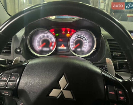 Черный Мицубиси Лансер, объемом двигателя 2 л и пробегом 200 тыс. км за 8000 $, фото 9 на Automoto.ua