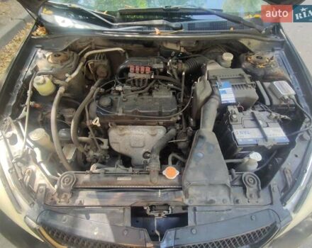 Чорний Міцубісі Lancer, об'ємом двигуна 1.6 л та пробігом 335 тис. км за 3100 $, фото 16 на Automoto.ua