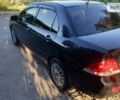 Чорний Міцубісі Lancer, об'ємом двигуна 1.6 л та пробігом 262 тис. км за 4700 $, фото 6 на Automoto.ua