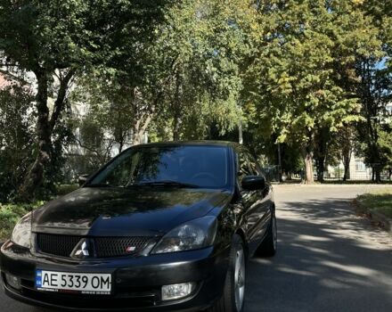 Черный Мицубиси Лансер, объемом двигателя 1.6 л и пробегом 184 тыс. км за 3700 $, фото 2 на Automoto.ua