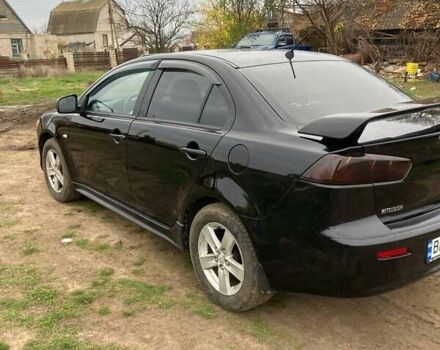 Чорний Міцубісі Lancer, об'ємом двигуна 2 л та пробігом 180 тис. км за 7500 $, фото 3 на Automoto.ua