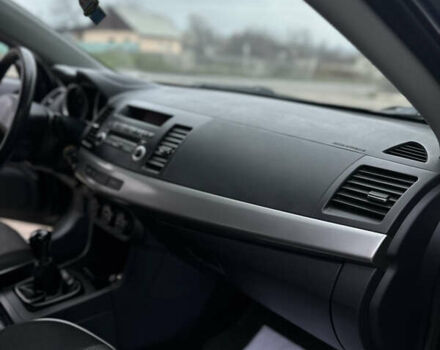 Чорний Міцубісі Lancer, об'ємом двигуна 1.5 л та пробігом 111 тис. км за 6999 $, фото 59 на Automoto.ua