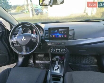 Мицубиси Лансер 2008 в Киеве на Automoto.ua Черный Мицубиси Лансер, объемом двигателя 2 л и пробегом 196 тыс. км за 5500 $, фото 26 на Automoto.ua