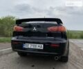 Чорний Міцубісі Lancer, об'ємом двигуна 2 л та пробігом 200 тис. км за 7600 $, фото 11 на Automoto.ua