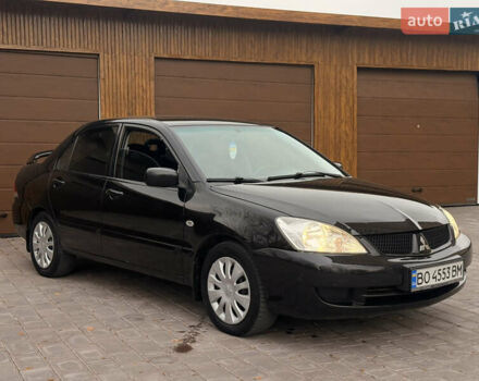 Чорний Міцубісі Lancer, об'ємом двигуна 1.6 л та пробігом 265 тис. км за 4700 $, фото 6 на Automoto.ua