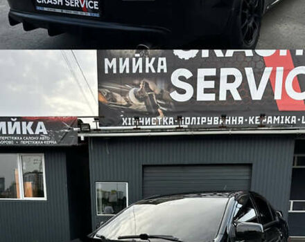 Черный Мицубиси Лансер, объемом двигателя 2 л и пробегом 269 тыс. км за 6800 $, фото 9 на Automoto.ua