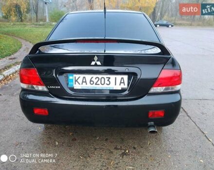 Мицубиси Лансер 2008 в Прилуках на Automoto.ua Черный Мицубиси Лансер, объемом двигателя 1.58 л и пробегом 219 тыс. км за 4900 $, фото 3 на Automoto.ua