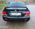 Мицубиси Лансер 2008 в Прилуках на Automoto.ua Черный Мицубиси Лансер, объемом двигателя 1.58 л и пробегом 219 тыс. км за 4900 $, фото 3 на Automoto.ua