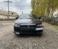 Чорний Міцубісі Lancer, об'ємом двигуна 1.5 л та пробігом 170 тис. км за 5500 $, фото 4 на Automoto.ua