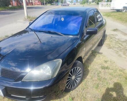 Чорний Міцубісі Lancer, об'ємом двигуна 0 л та пробігом 205 тис. км за 5250 $, фото 1 на Automoto.ua