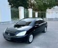 Чорний Міцубісі Lancer, об'ємом двигуна 1.6 л та пробігом 174 тис. км за 4999 $, фото 1 на Automoto.ua