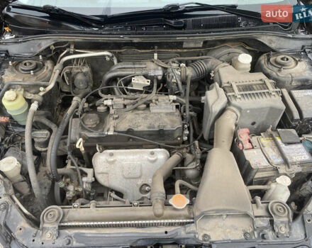 Черный Мицубиси Лансер, объемом двигателя 1.58 л и пробегом 211 тыс. км за 6333 $, фото 33 на Automoto.ua