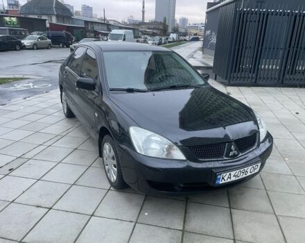 Черный Мицубиси Лансер, объемом двигателя 1.6 л и пробегом 226 тыс. км за 3750 $, фото 5 на Automoto.ua