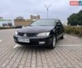 Черный Мицубиси Лансер, объемом двигателя 1.58 л и пробегом 173 тыс. км за 4900 $, фото 1 на Automoto.ua