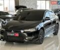 Чорний Міцубісі Lancer, об'ємом двигуна 2 л та пробігом 313 тис. км за 7690 $, фото 1 на Automoto.ua