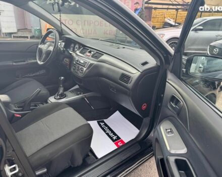 Мицубиси Лансер 2008 в Запорожье на Automoto.ua Черный Мицубиси Лансер, объемом двигателя 1.6 л и пробегом 316 тыс. км за 4290 $, фото 13 на Automoto.ua